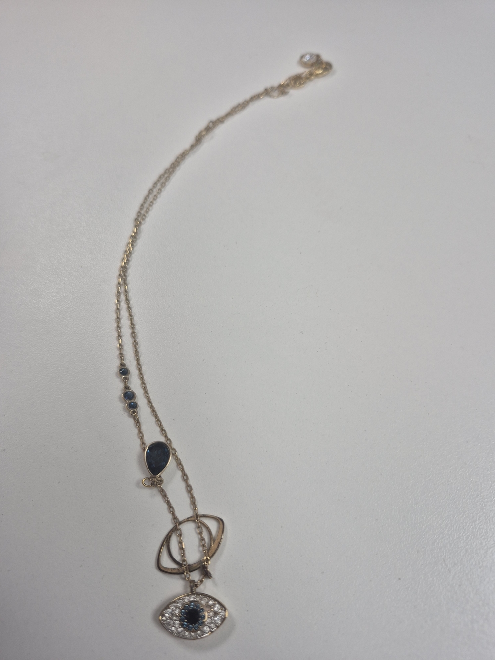 Swarovski Gold-Tone Necklace with Blue Teardrop and Eye Pendant